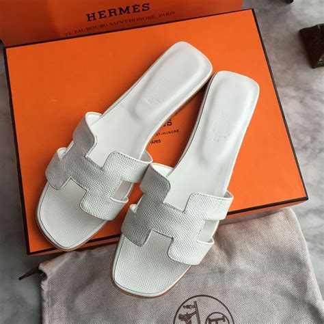 female Hermes slippers